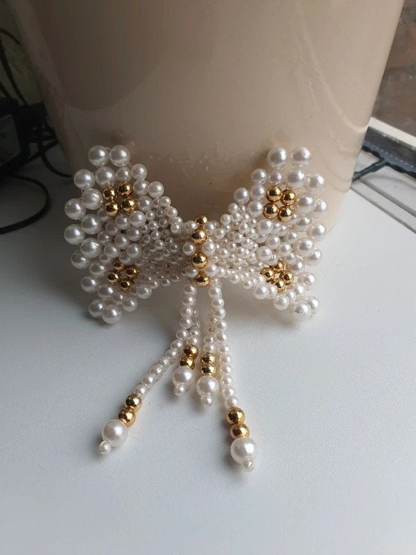 Vintage Parel Haarspeld Strik Wit Goudkleurig Bridal Chic, Ophalen of Verzenden, Zo goed als nieuw, Haarspeld