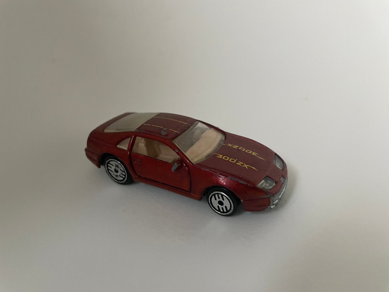 model Datsun Nissan 300ZX 300 ZX, rood dec, 1/50, Hot Wheels, Hobby en Vrije tijd, Ophalen of Verzenden, Gebruikt, Auto