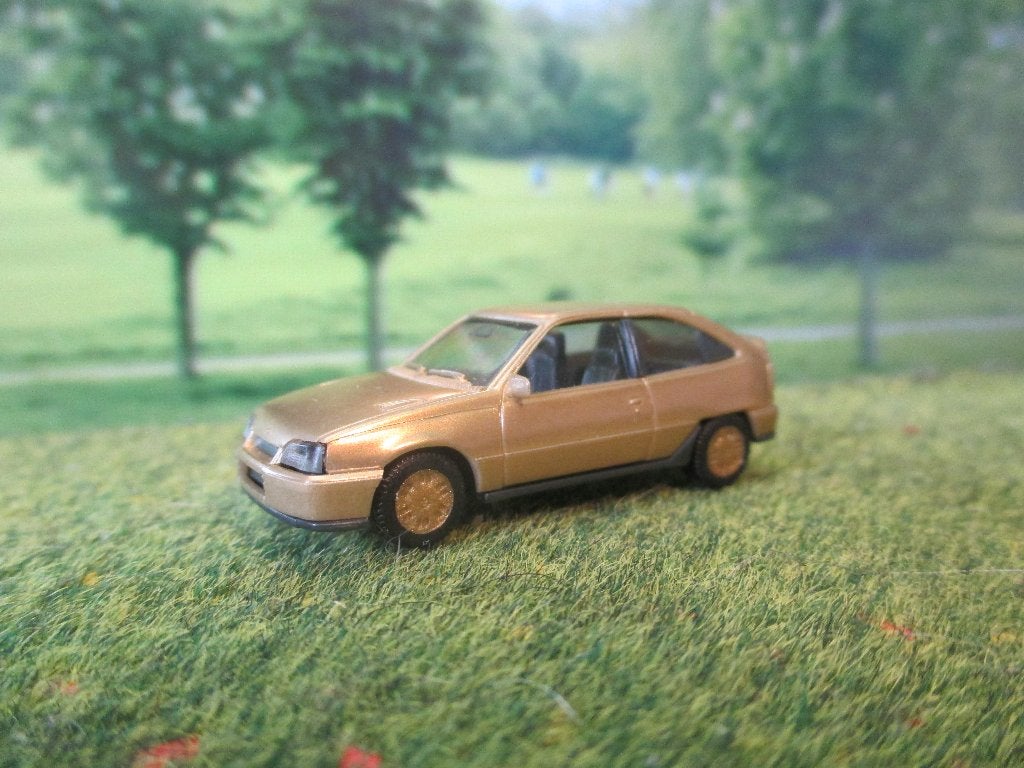 Opel Kadett E Gsi - Herpa metallic-goud, Ophalen of Verzenden, Zo goed als nieuw, Auto, Herpa