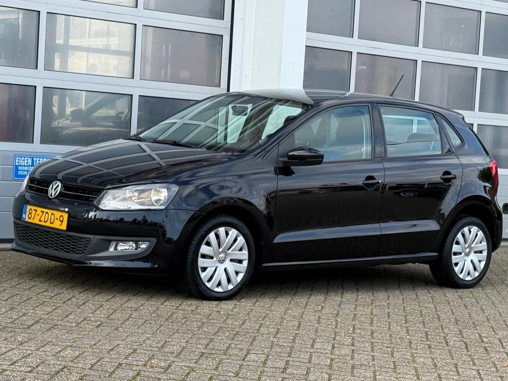 Volkswagen POLO 1.2 TSI 90PK Comfortline 5-drs Airco Cruise, Auto's, Euro 5, Electronic Stability Program (ESP), 4 cilinders, Zwart