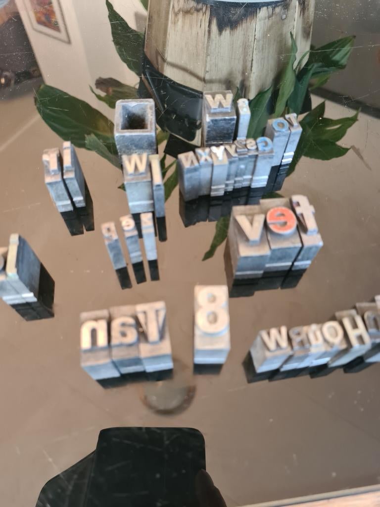 Loden letters en vulstukken, Ophalen