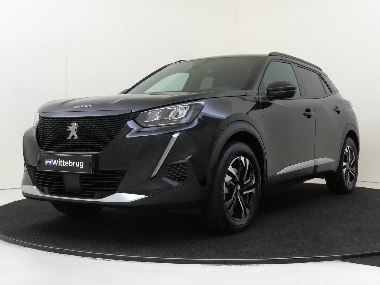 Peugeot e-2008 EV Allure Pack 50 kWh | Camera | Navigatie |, 136 pk, Gebruikt, Zwart, Origineel Nederlands