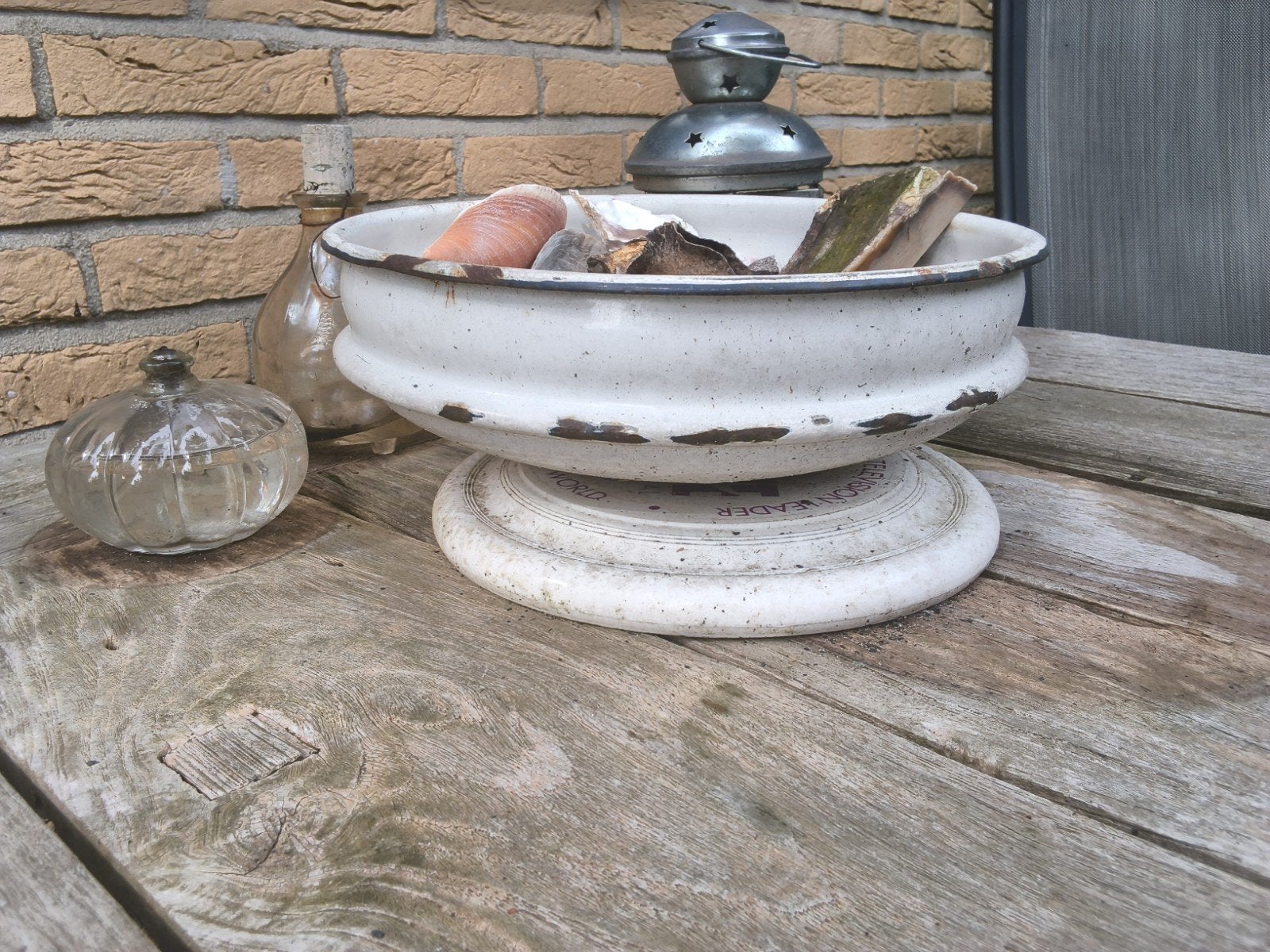 Decoratieve schaal met schelpen en maritieme items, Ophalen