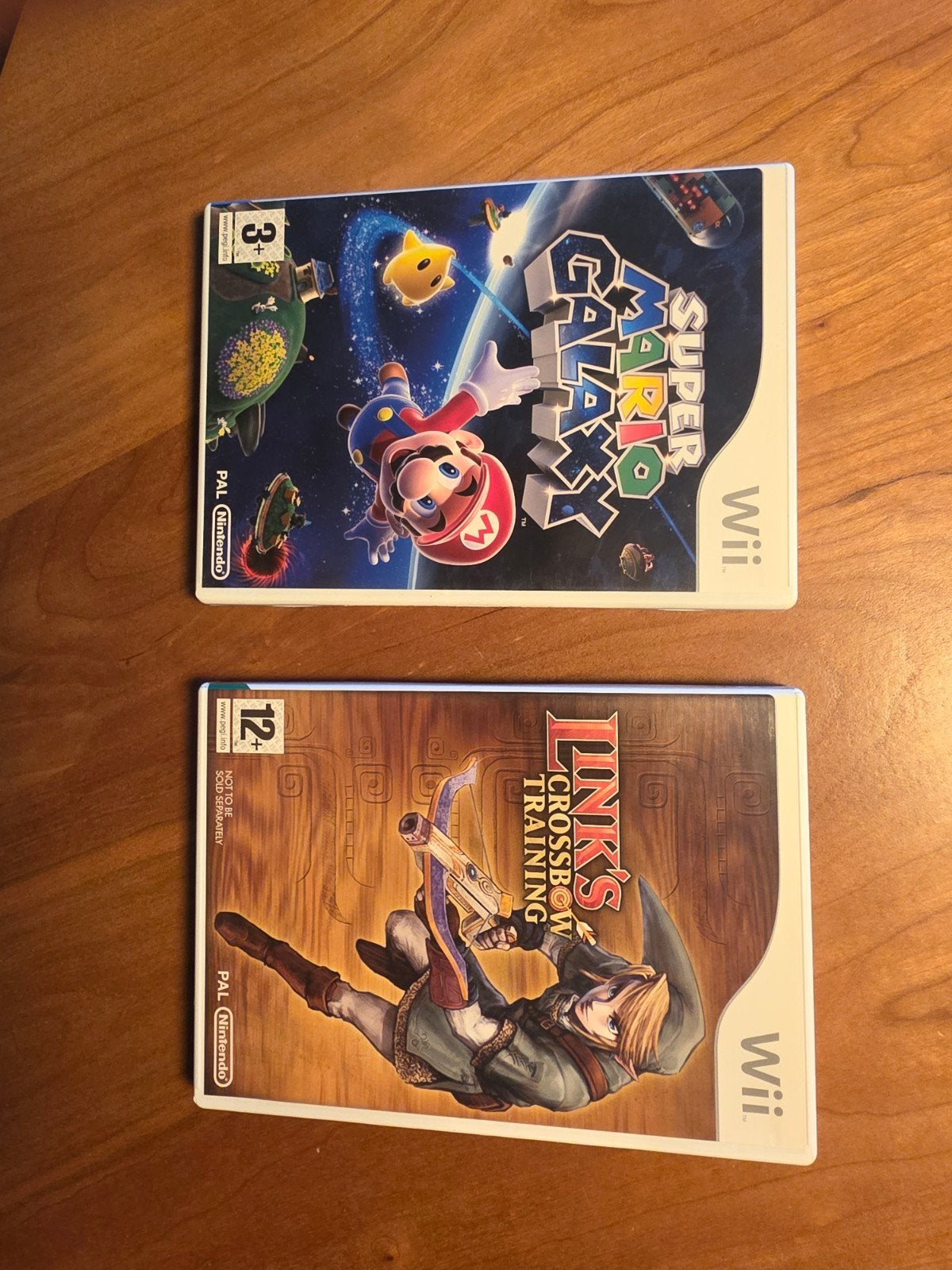 Wii games: Super Mario Galaxy & Link's Crossbow training, Spelcomputers en Games, Games | Nintendo Wii, Ophalen of Verzenden, Zo goed als nieuw