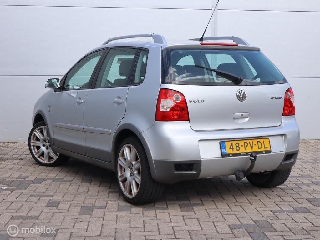 Volkswagen Polo 1.4-16V FUN Pano Airco Cruise trekhaak, Voorwielaandrijving, Elektrische ramen, 15 km/l, Gebruikt