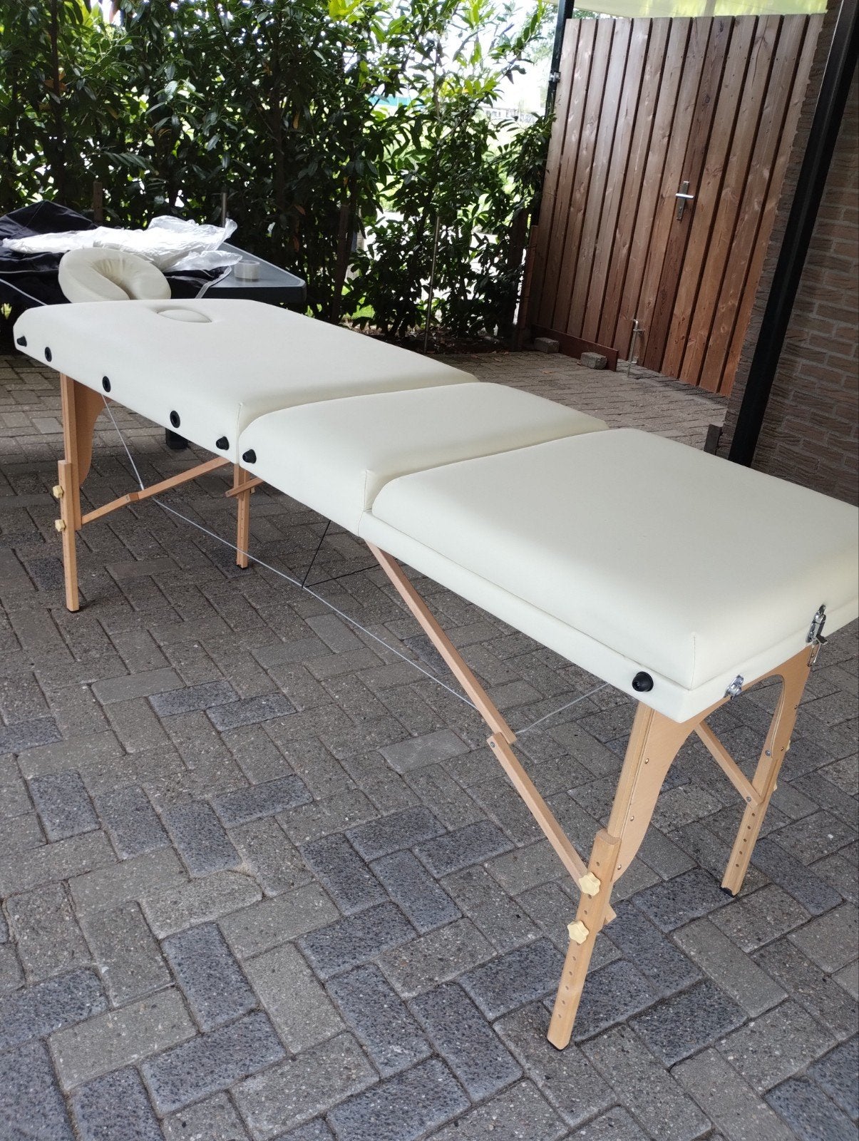 Inklapbare, in hoogte verstelbare massagetafel, Ophalen