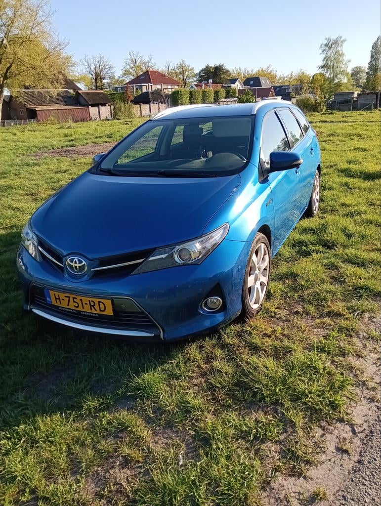 Toyota Auris 1.8 Hybrid Touring Sports CVT 2014 Blauw, Auto's, 345 kg, Blauw, 25 km/l, Auris