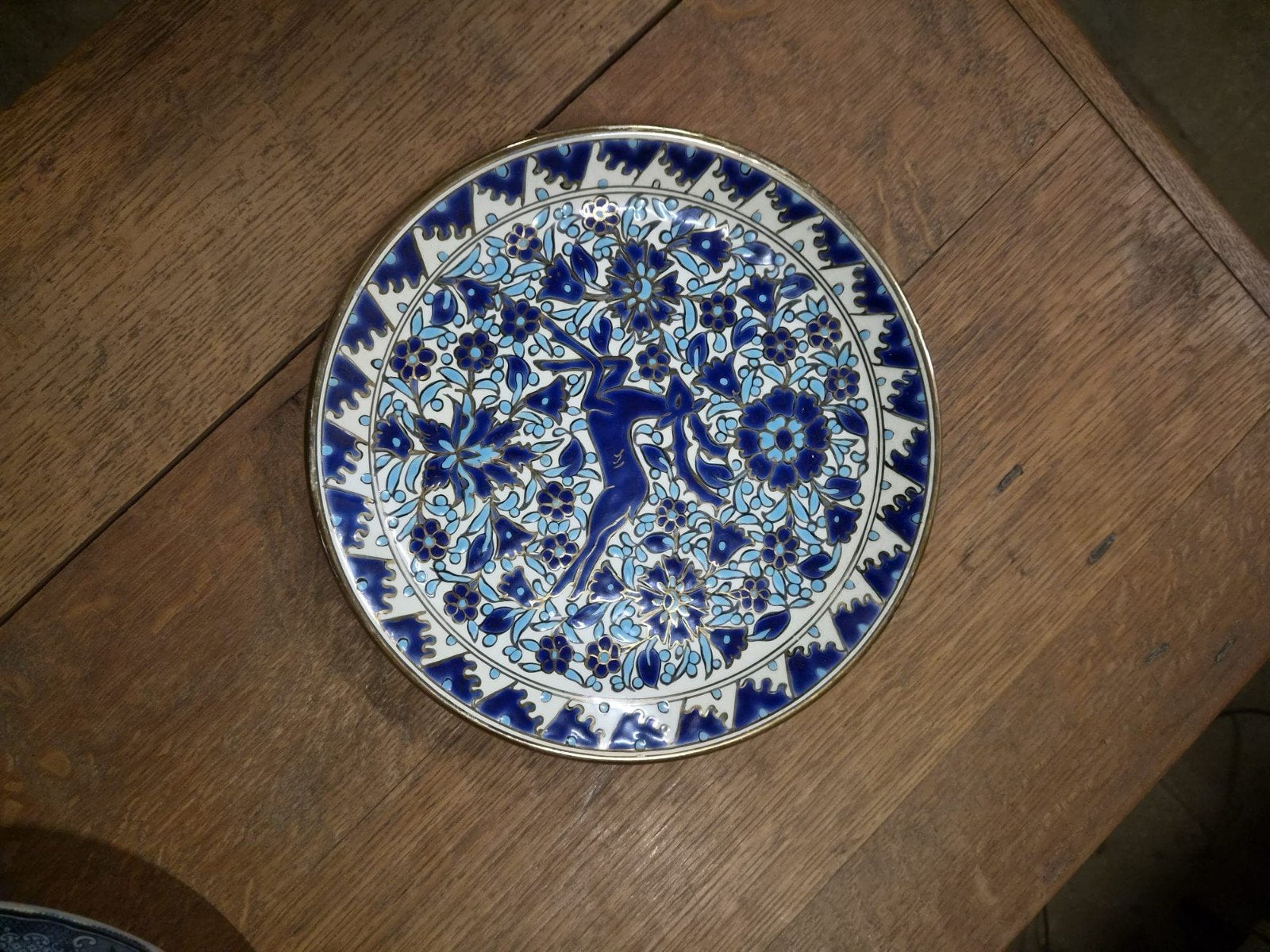 Decoratief bord met blauw-wit patroon en hert, Ophalen