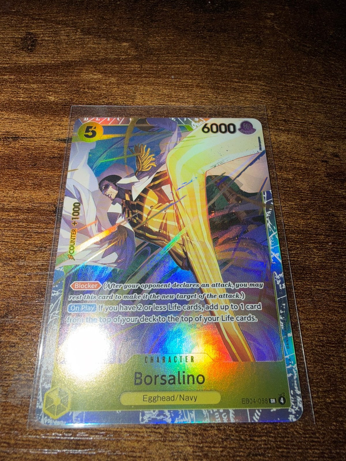 One Piece TCG EB04-058 Borsalino (Egghead/Navy) - Foil, Hobby en Vrije tijd, Verzamelkaartspellen | Magic the Gathering, Ophalen of Verzenden