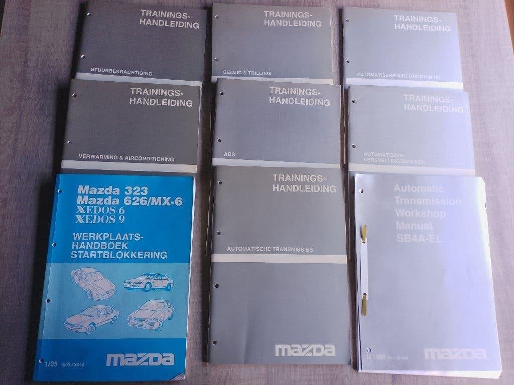Mazda dealer werkplaats trainingsboeken 1992 - 98, Boeken, Verzenden, Gelezen, Mazda