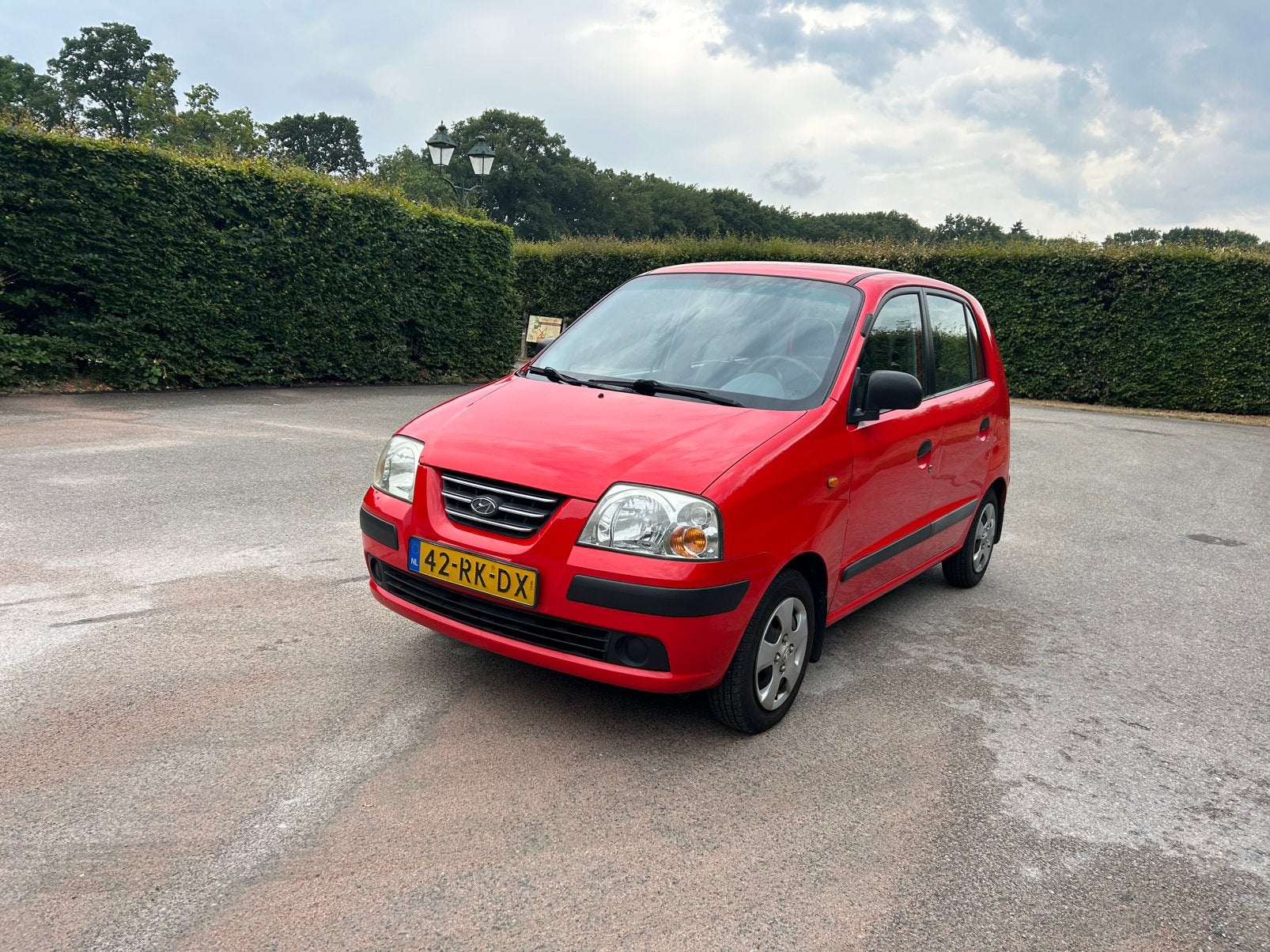 Hyundai Atos 1.1 2005 Rood, Voorwielaandrijving, 31 €/maand, 4 cilinders, Origineel Nederlands