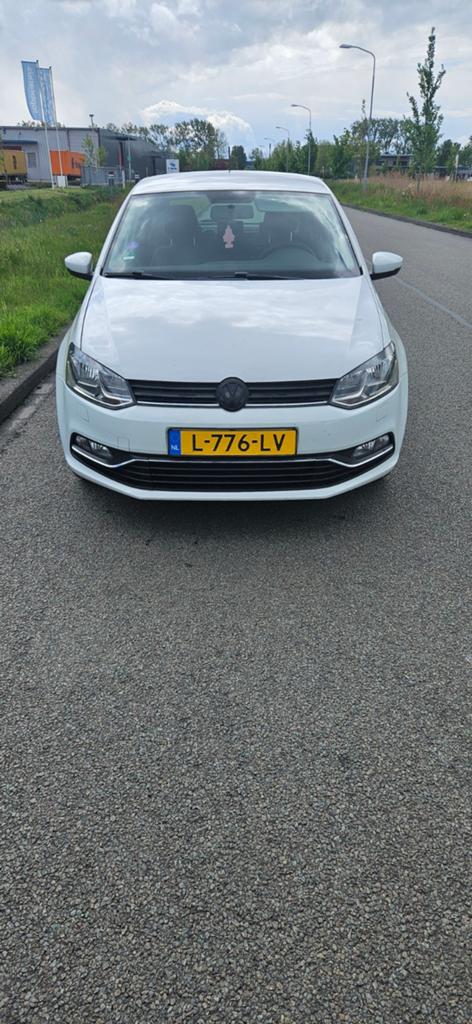 Volkswagen Polo 1.0 TSI 55KW 2015 Wit, Voorwielaandrijving, Stof, Wit, Stoelverwarming