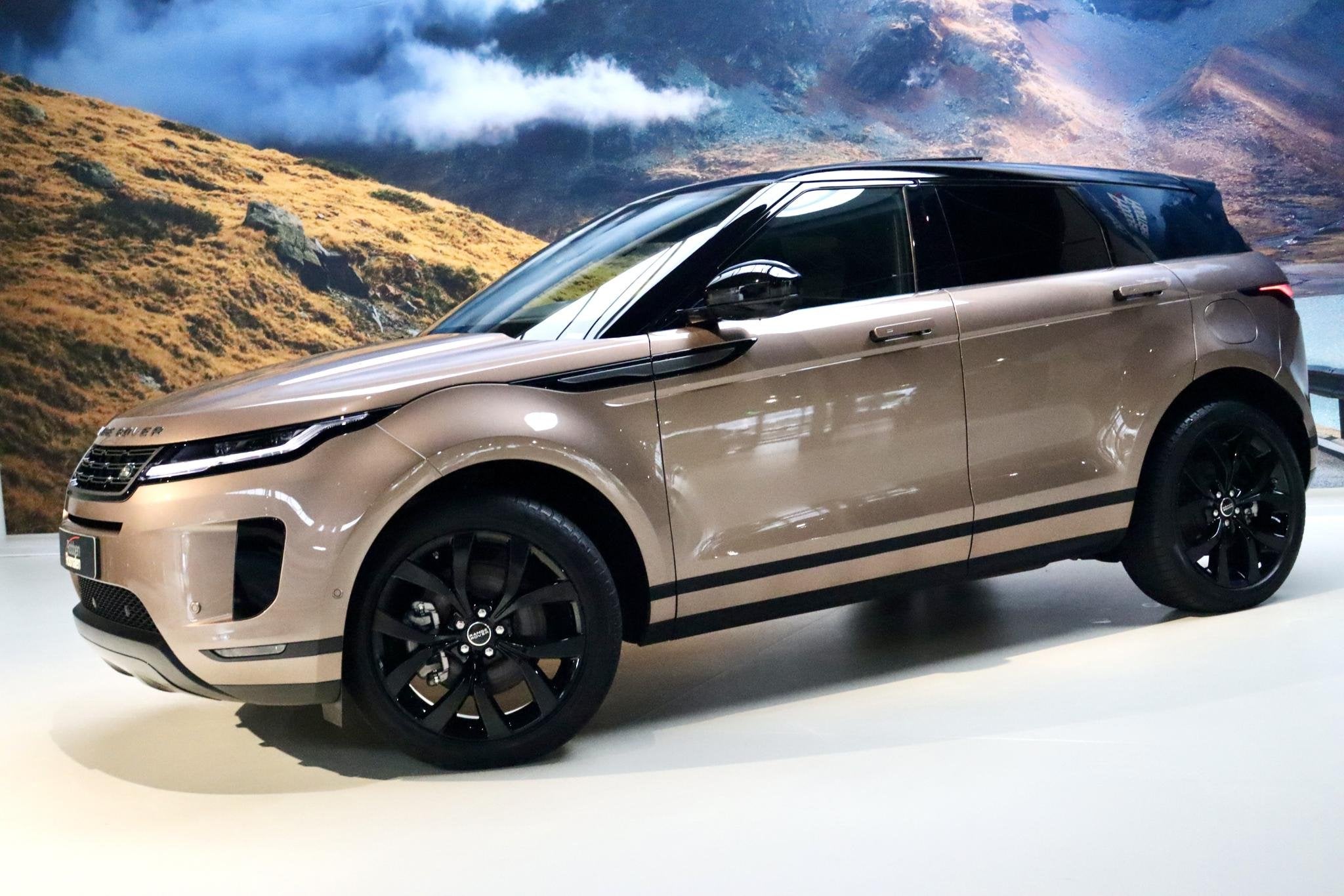 Land Rover Range Rover Evoque 1.5 P300e AWD FACELIFT|PANO|Hu, Automaat, 309 pk, Bruin, 15 kWh