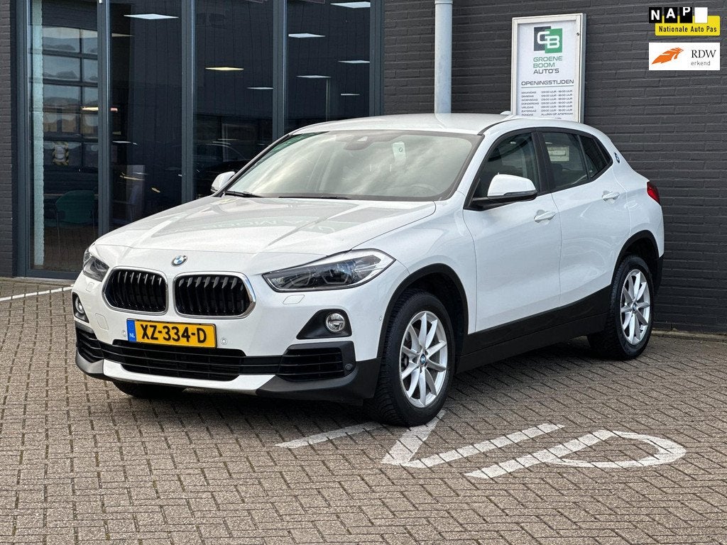 BMW X2 SDrive18i High Executive/XENON/NAVI/AUTOMAAT/NETTE ST, Auto's, BMW, Euro 6, Wit, 3 cilinders, 1390 kg