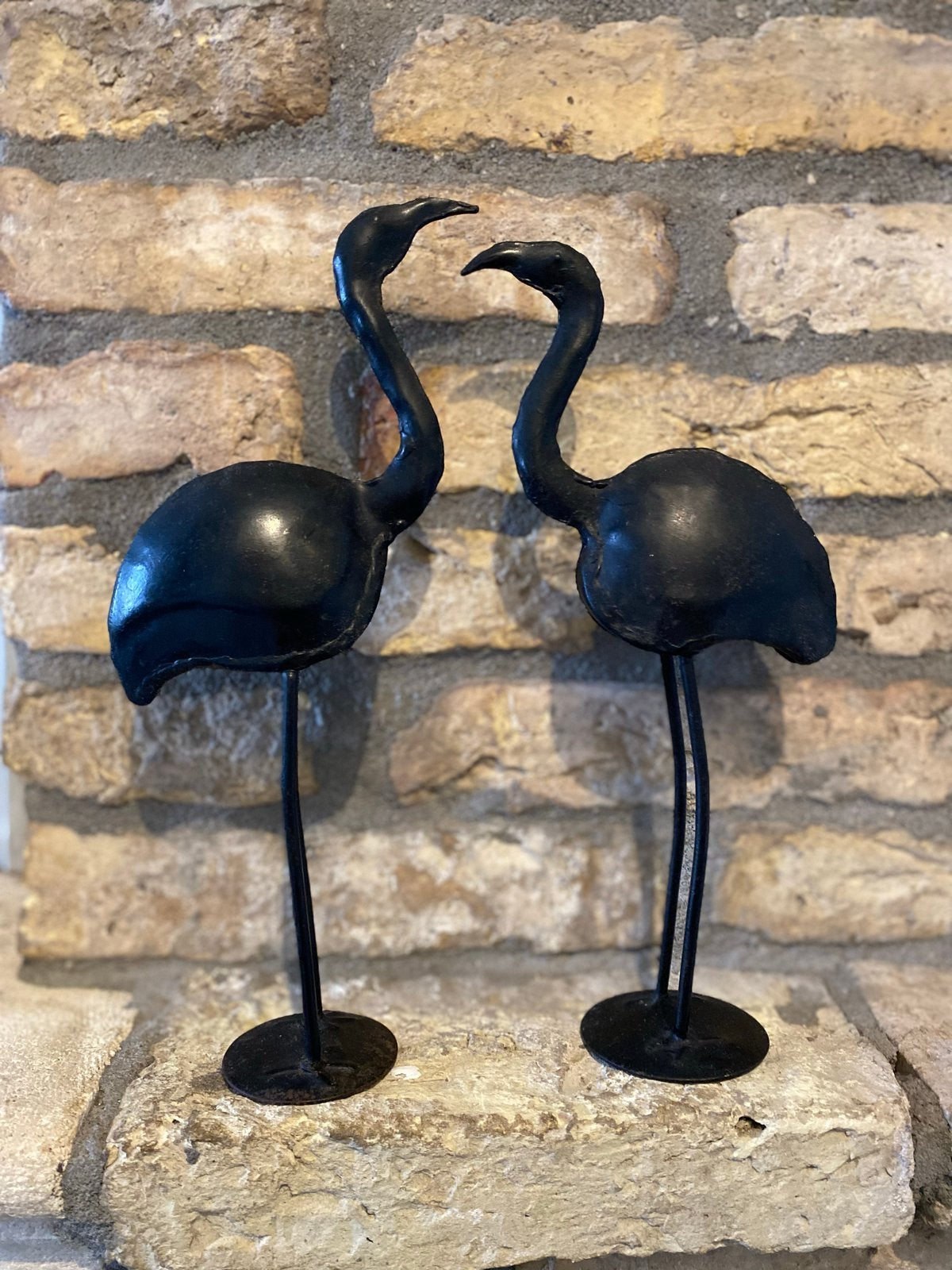 Twee metalen flamingo beeldjes - Decoratie, Ophalen of Verzenden, Gebruikt, Zwart, Metaal
