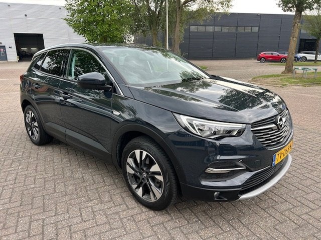 Opel Grandland X 1.2 Turbo Innovation CARPLAY NAV CRUISE NAP, Auto's, Voorwielaandrijving, Dealer onderhouden, Stof, Gebruikt