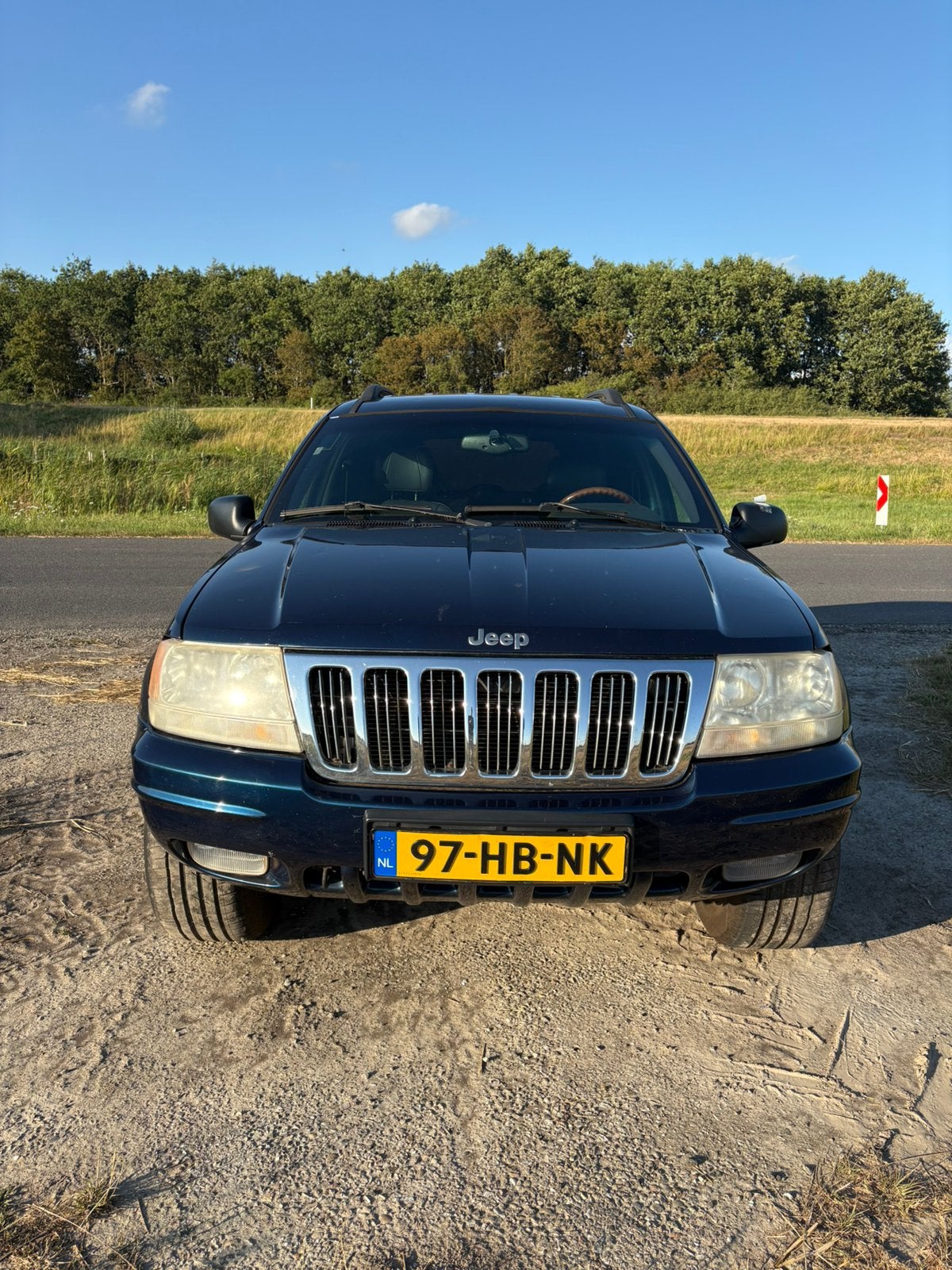 Jeep Grand Cherokee 4.7 I V8 Limited AUT 1999 Blauw, Auto's, Automaat, 1826 kg, 4701 cc, Vierwielaandrijving