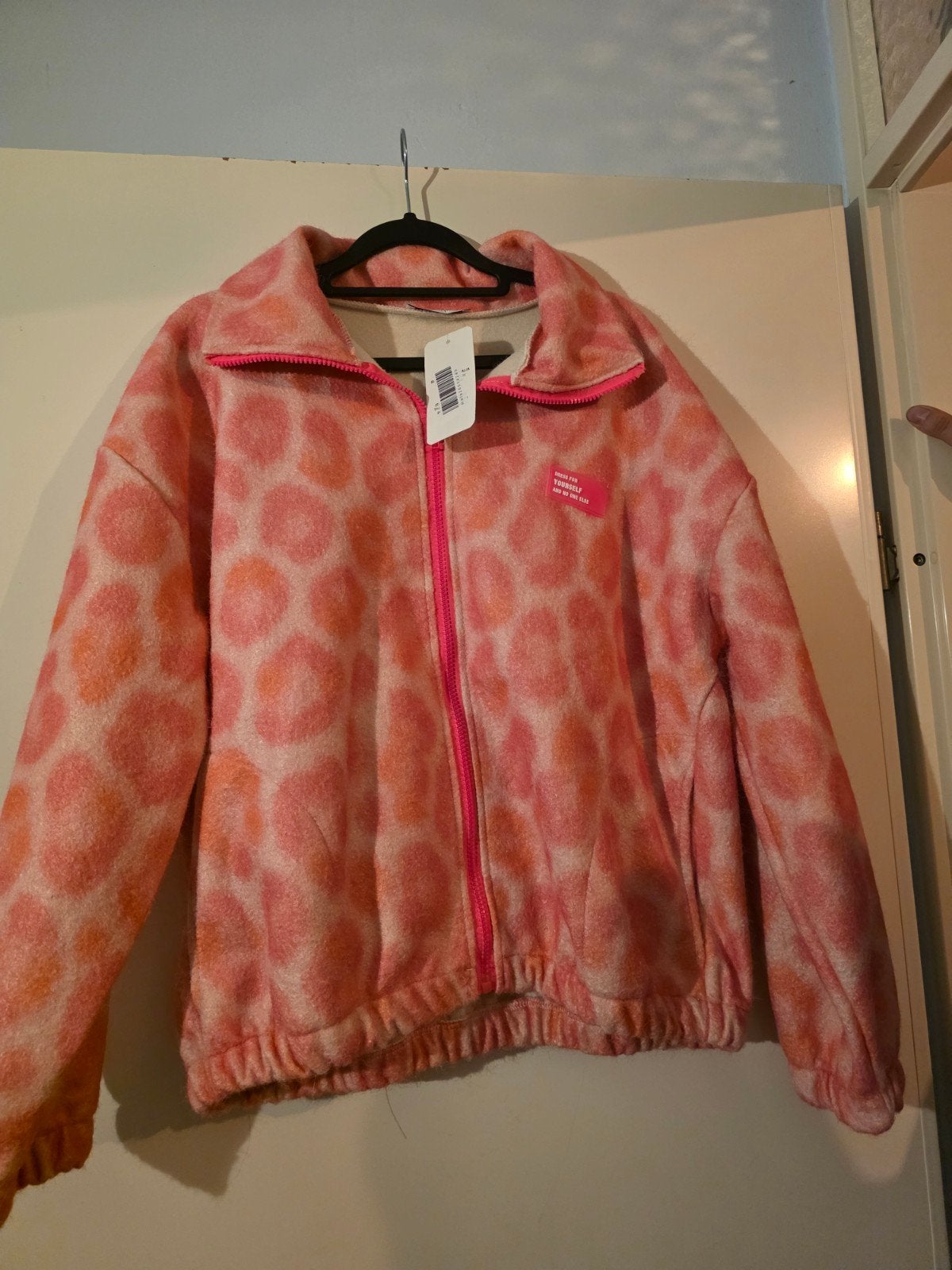 Roze/oranje fleece jas met panterprint, maat 42/44, Ophalen of Verzenden