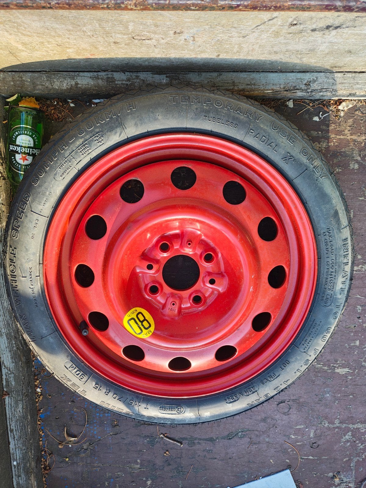 Michelin T 115/70 R 15 thuiskomer op rode velg, Ophalen, Gebruikt