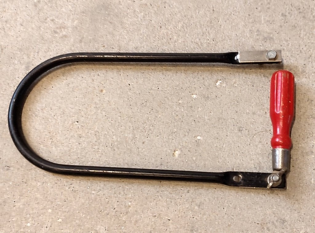 Handfiguurzaag / zaagbeugel, Ophalen