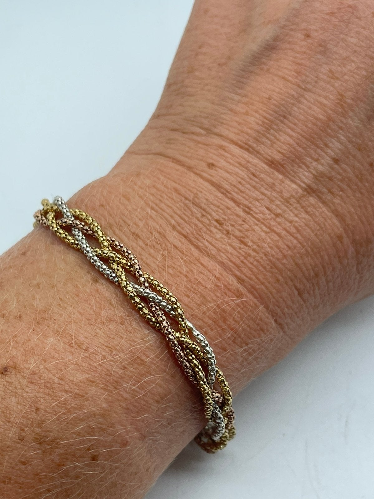 F912 Prachtige zilveren tricolor armband, Ophalen of Verzenden, X, Goud, Zilver
