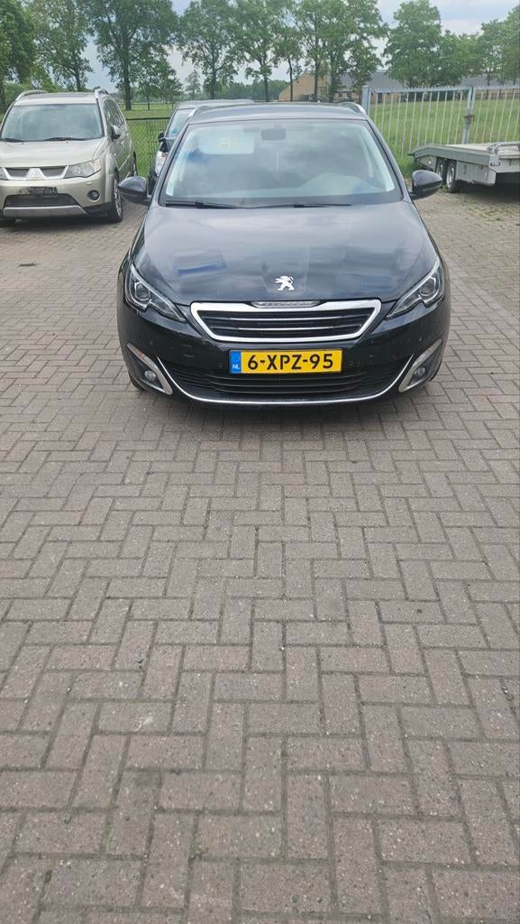Peugeot 308 1.2 E-thp 96KW/130PK SW AUT 2014 Zwart, Auto's, Peugeot, Euro 5, Stof, Zwart, 635 kg
