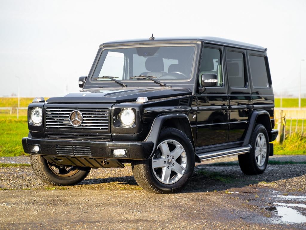 Mercedes G500 5.5 388 PK Youngtimer als nieuw, Auto's, Mercedes-Benz, Automaat, G-Klasse, Zwart, Leder