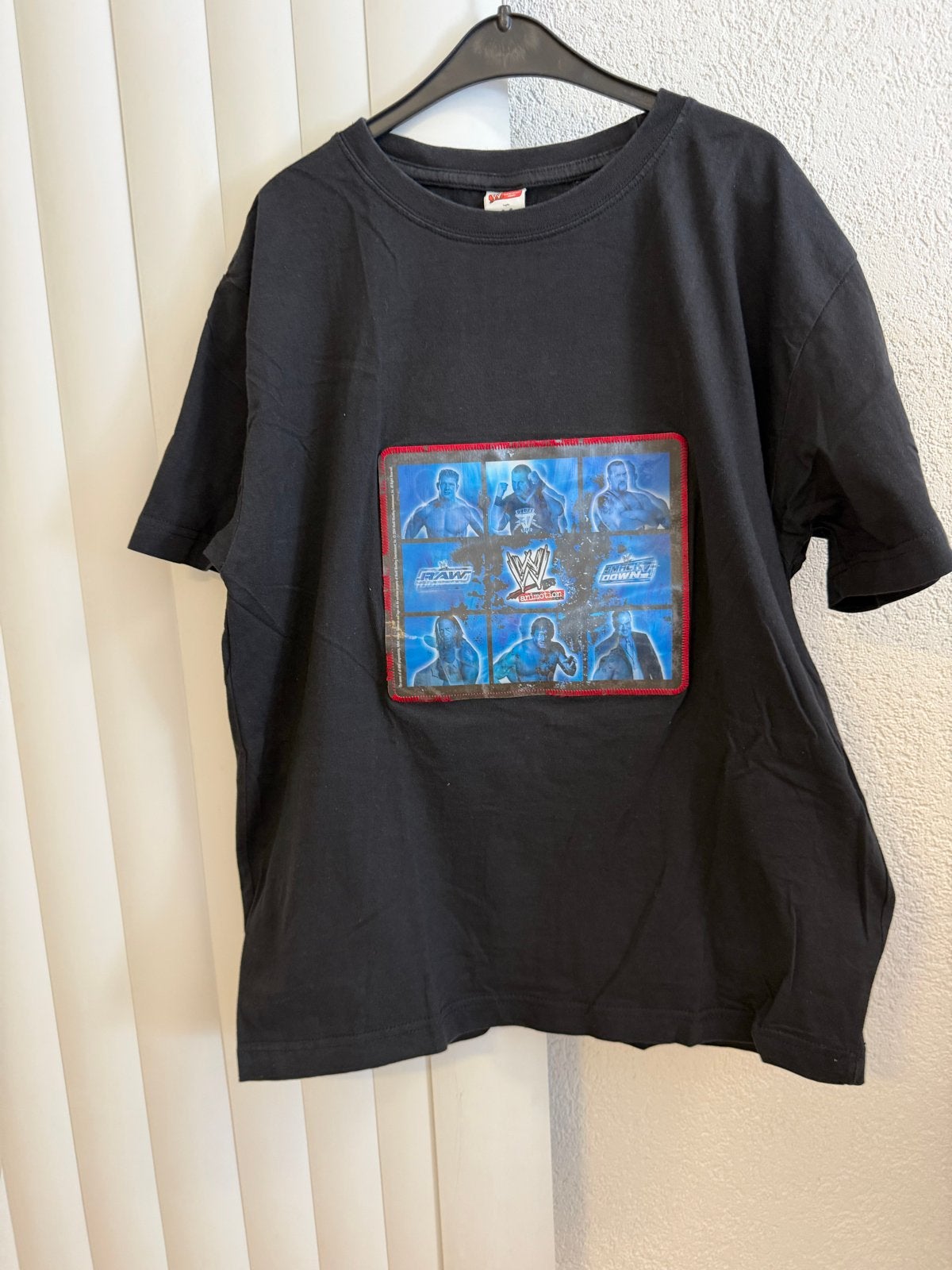 Origineel WWE T-shirt met opvallende print - Maat M, Kleding | Heren, Ophalen of Verzenden, Nieuw, Maat 48/50 (M), Zwart