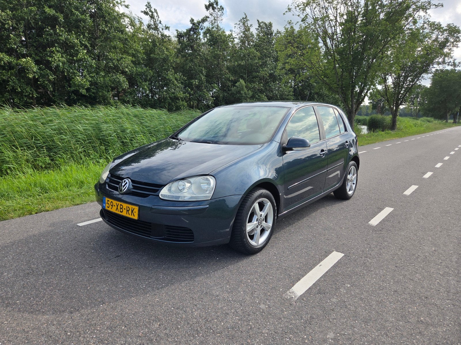 Volkswagen Golf 1.6 16V 85KW Tour Airco Carplay Ketting-V NL, Auto's, Voorwielaandrijving, 4 cilinders, Origineel Nederlands, 1400 kg