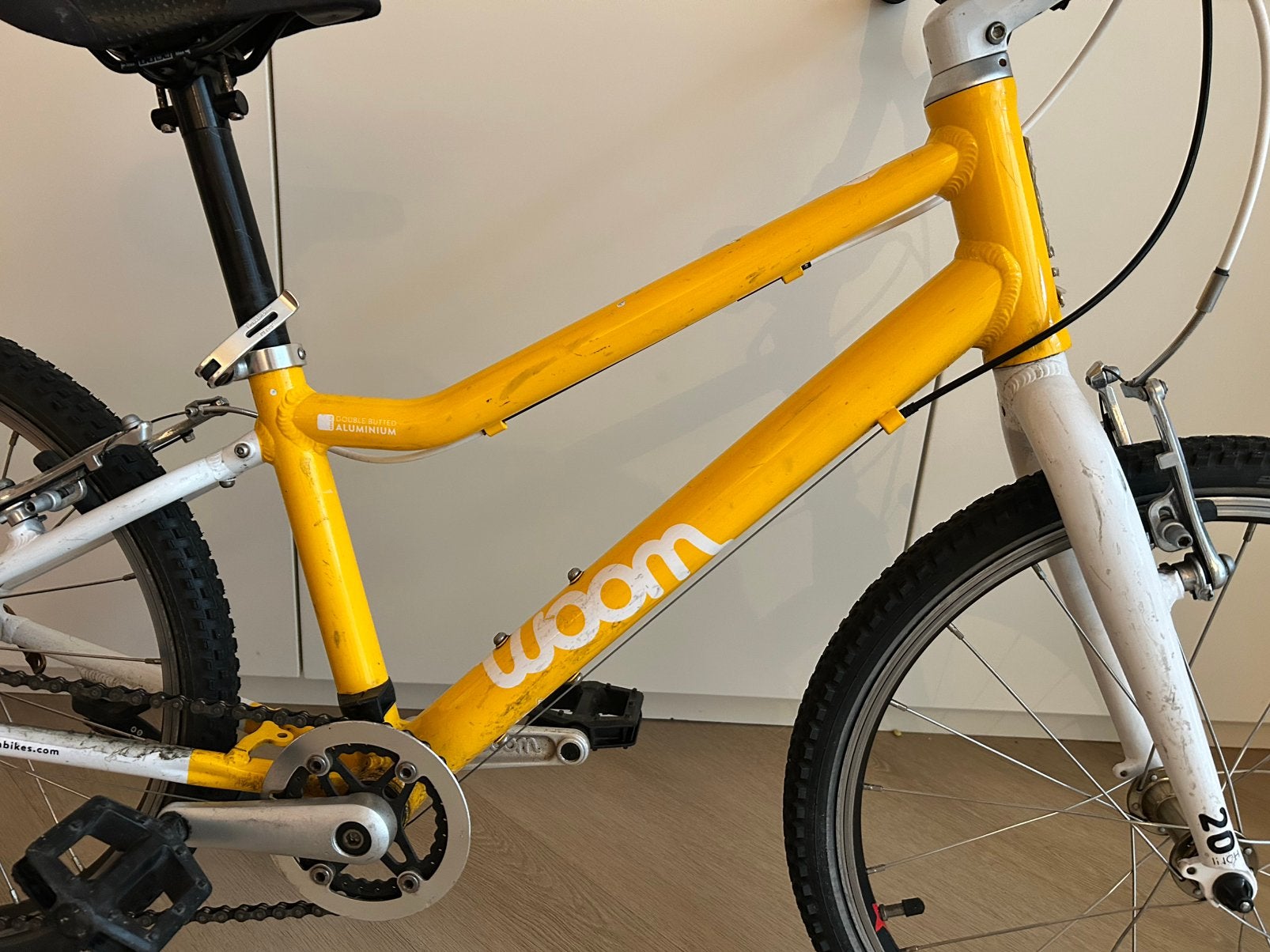 Woom 4 20 inch fiets goede staat, Ophalen, Gebruikt, Velgrem, 20 inch of meer