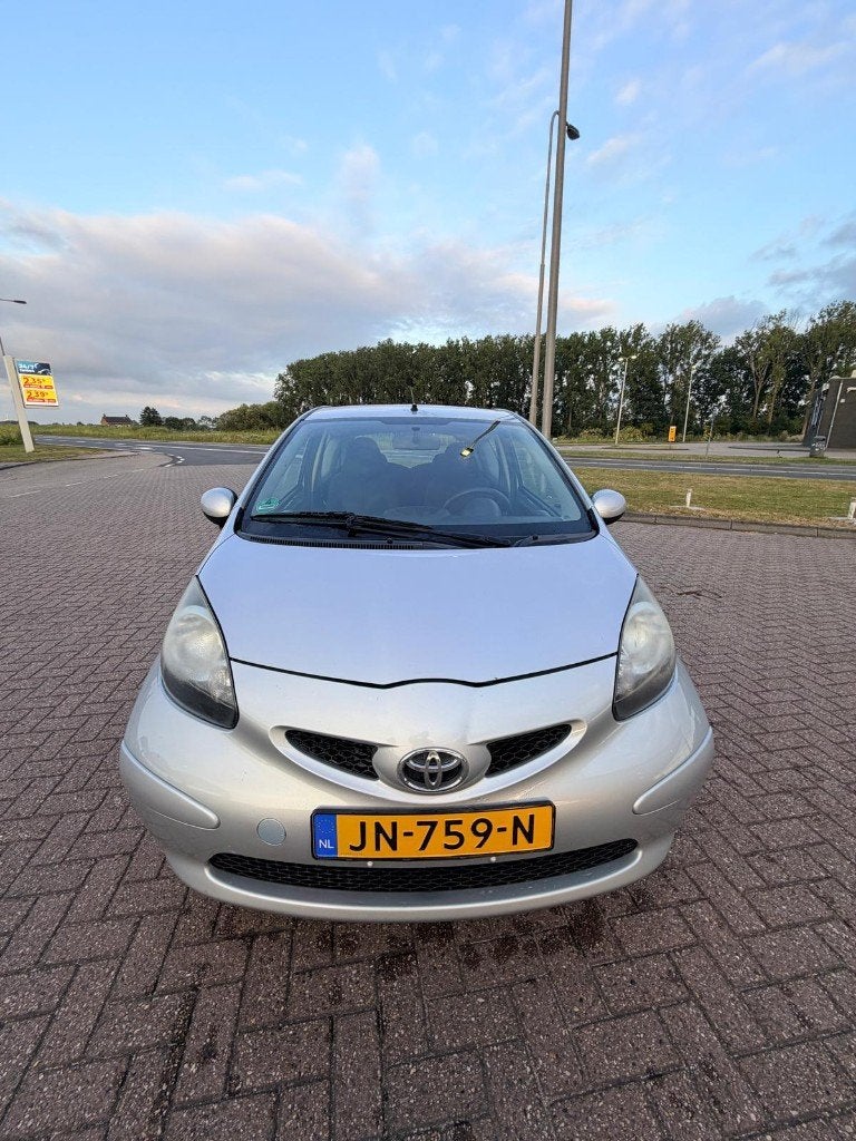 Toyota Aygo 1.0 12V Vvt-i 3DRS MMT 2006 Grijs, Voorwielaandrijving, Stof, Zwart, 4 stoelen