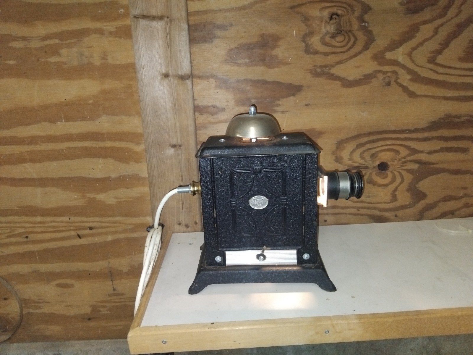 Antieke toverlantaarn / diaprojector, Ophalen