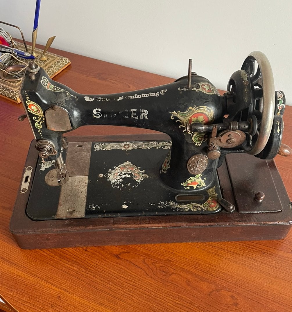 Antieke Singer Naaimachine, Ophalen