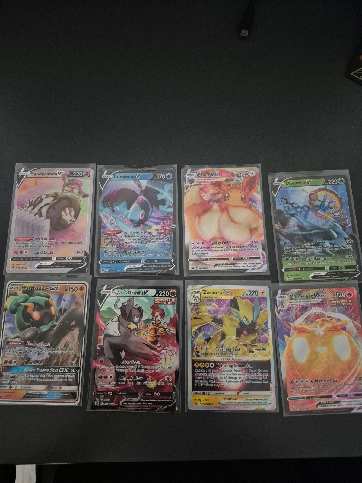 Pokémon V en VMAX kaarten met sleeves (mogelijk 1 nep), Ophalen of Verzenden, Gebruikt, Meerdere kaarten, Foil