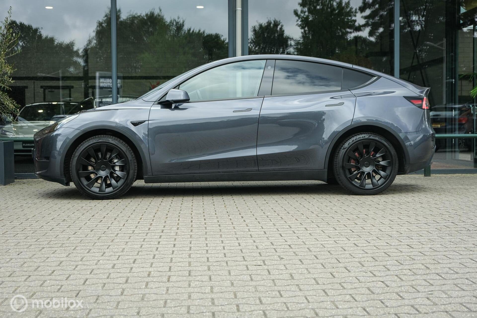 Tesla Model Y Long Range AWD 75 kWh | Full Self-Driving pack, Automaat, Stof, Gebruikt, Zwart