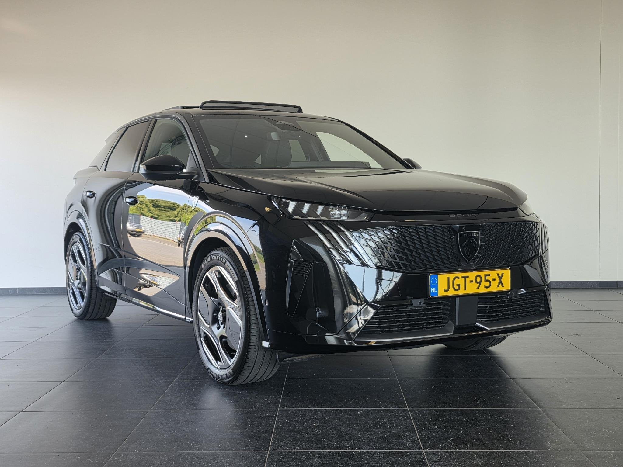 Peugeot e-3008 Launch Edition 325 Dual Motor 73 kWh | Warmte, Auto's, Automaat, Gebruikt, Zwart, Vierwielaandrijving