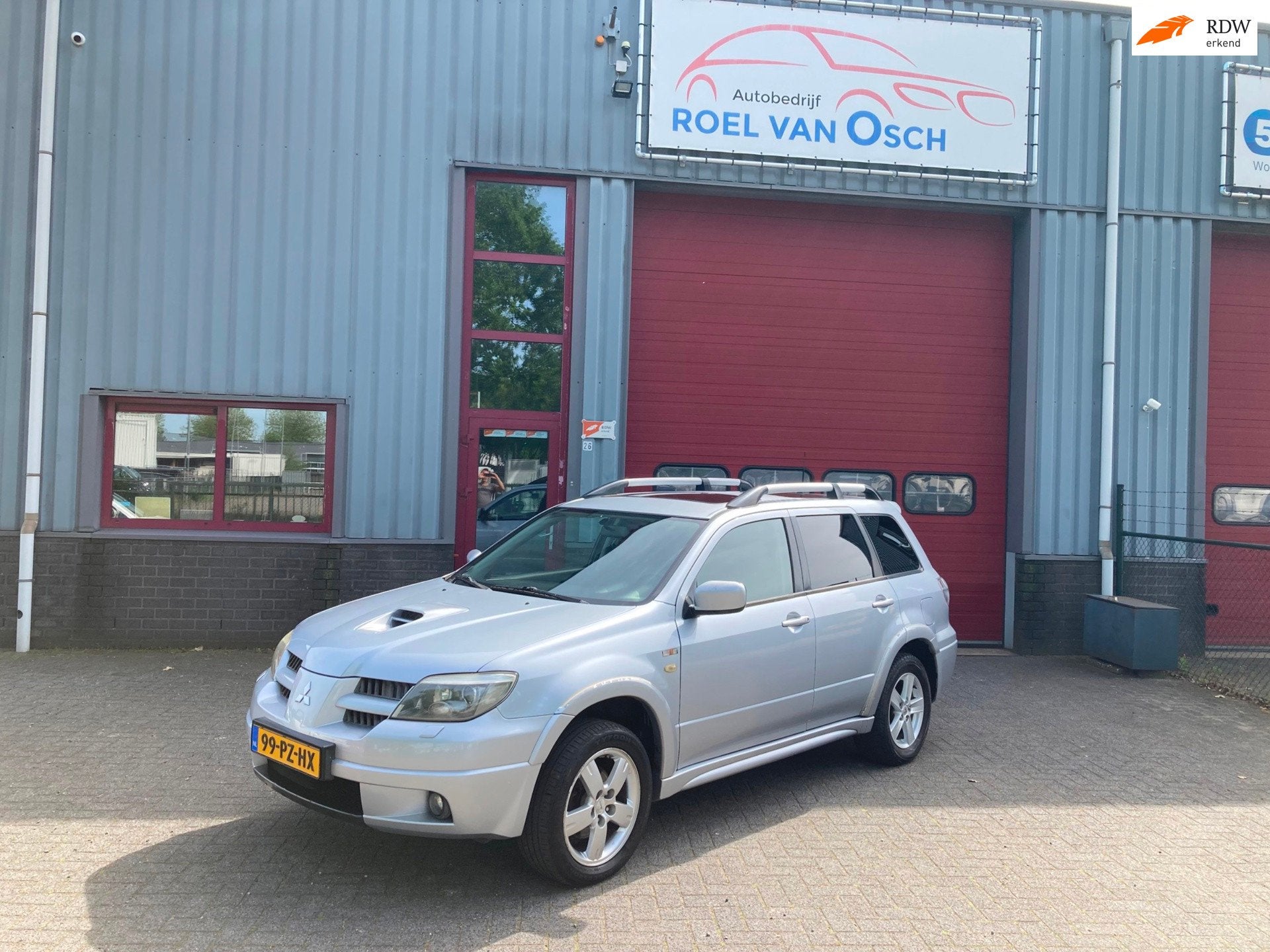 Mitsubishi Outlander 2.0 Turbo 201pk 4WD EVO EVOLUTION 201pk, Auto's, Mitsubishi, Zwart, Bedrijf, Handgeschakeld, 1570 kg