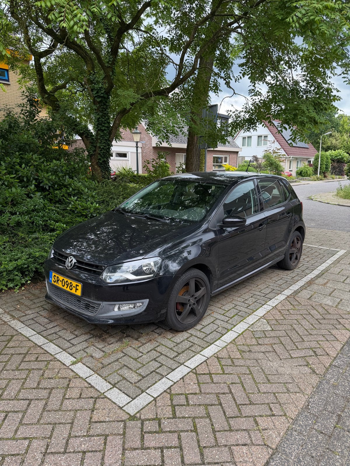 Volkswagen Polo 1.2 TSI 77KW 2012 Zwart, 6 versnellingen, Stof, 40 €/maand, Zwart, Zwart