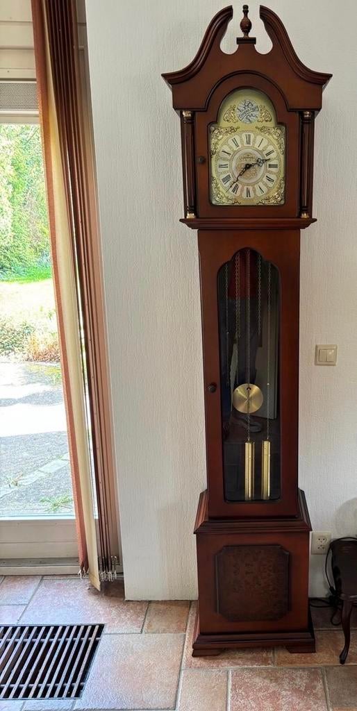 Junghans staande klok, Ophalen