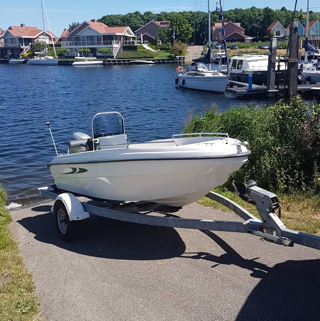 Karel 450 open (console boot) + Honda 15PK + trailer, Ophalen, 15 pk, Met afstandsbediening, Zo goed als nieuw