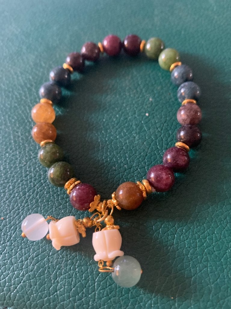 Kralen armbandje met bedels, Sieraden, Tassen en Uiterlijk, Armbanden, Ophalen of Verzenden, Zo goed als nieuw, Elastiek, Met bedels of kralen