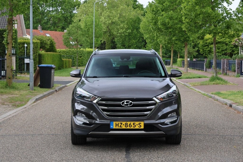 Hyundai Tucson 1.6 T-GDi Premium 4WD | AUTOMAAT | PANO | NAV, Auto's, Hyundai, Gebruikt, 4 cilinders, Bruin, Bedrijf