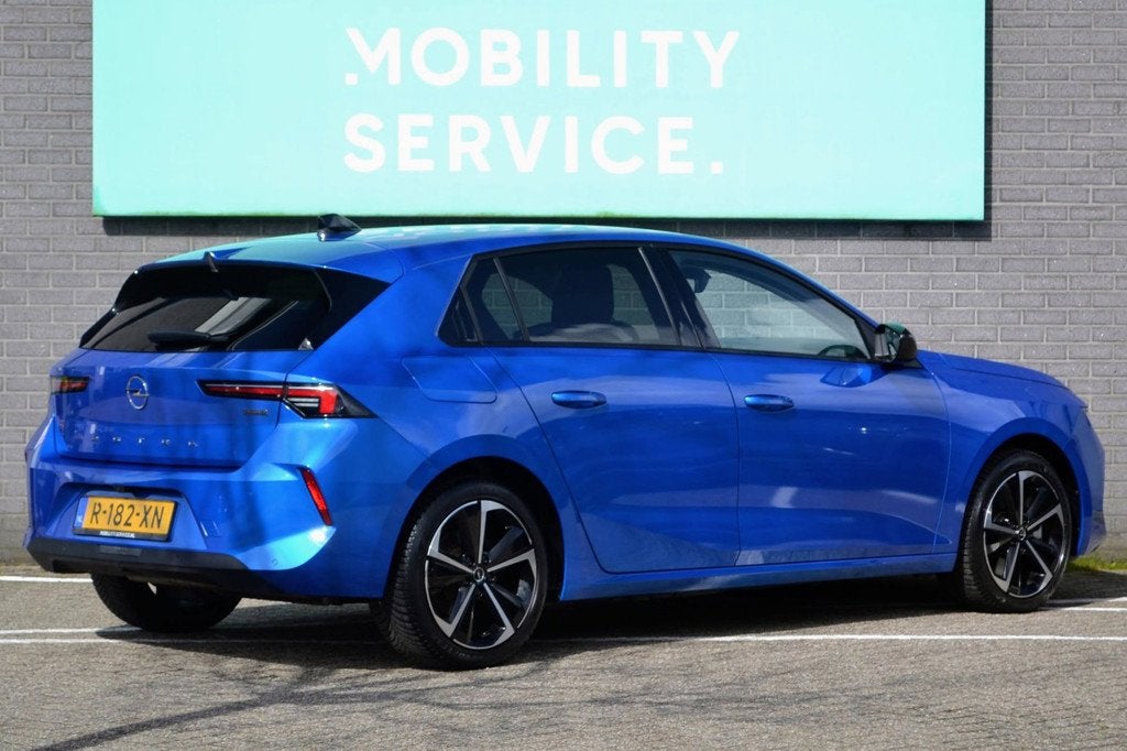 Opel Astra 1.6 Hybrid Business Edition SOH96% CarPlay LED VC, Auto's, Opel, Gebruikt, 4 cilinders, 150 pk, Blauw