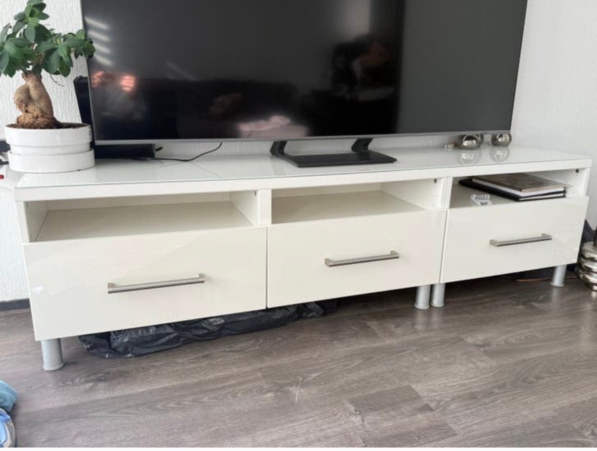 Mooi wit TV-meubel met glasplaat - 180x40 cm, Ophalen, 150 tot 200 cm, 25 tot 50 cm, Glas
