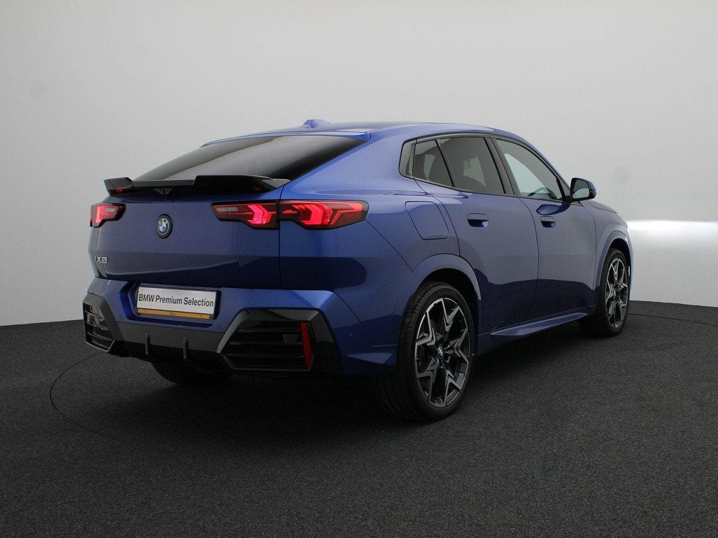 BMW iX2 eDrive20 M Sport Edition | M Sportpakket Pro | Premi, Auto's, BMW, IX2, Met garantie (alle), Blauw, 67 kWh