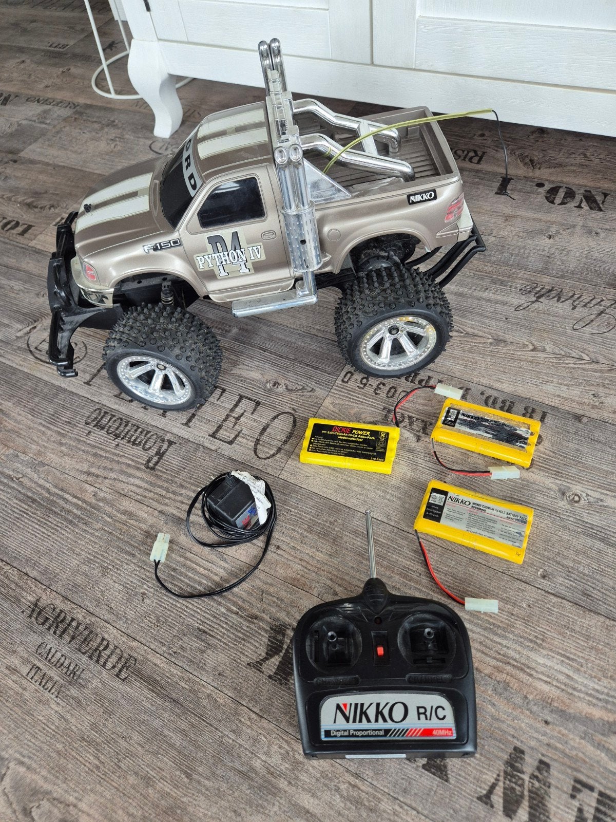 Grote Nikko RC auto Ford F-150 Python IV met accu's en lader, Ophalen of Verzenden, Auto offroad