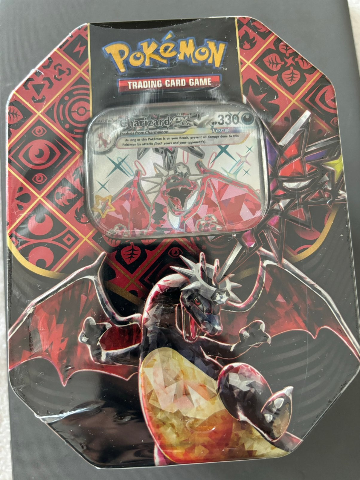 Paldean Fates: Tera Charizard ex Tin, Ophalen of Verzenden, Zo goed als nieuw