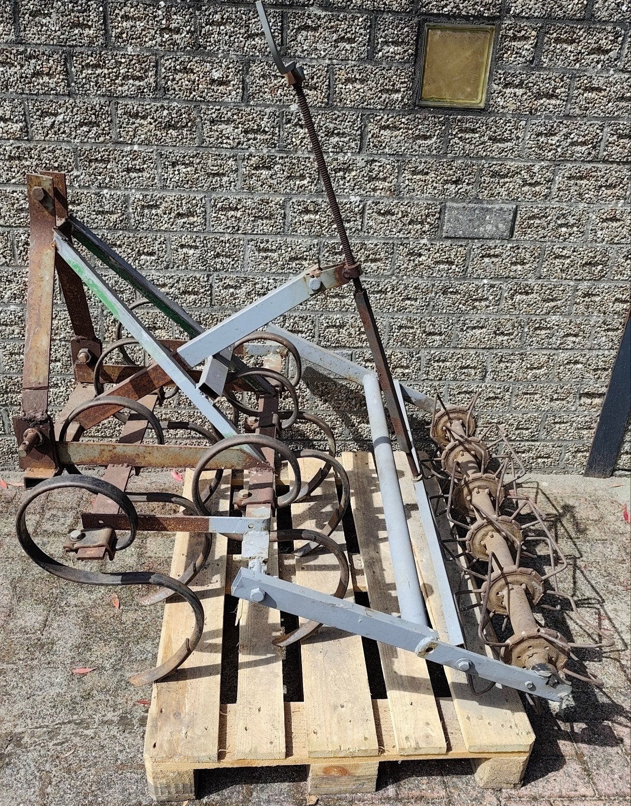 Triltandcultivator voor minitractor, Ophalen