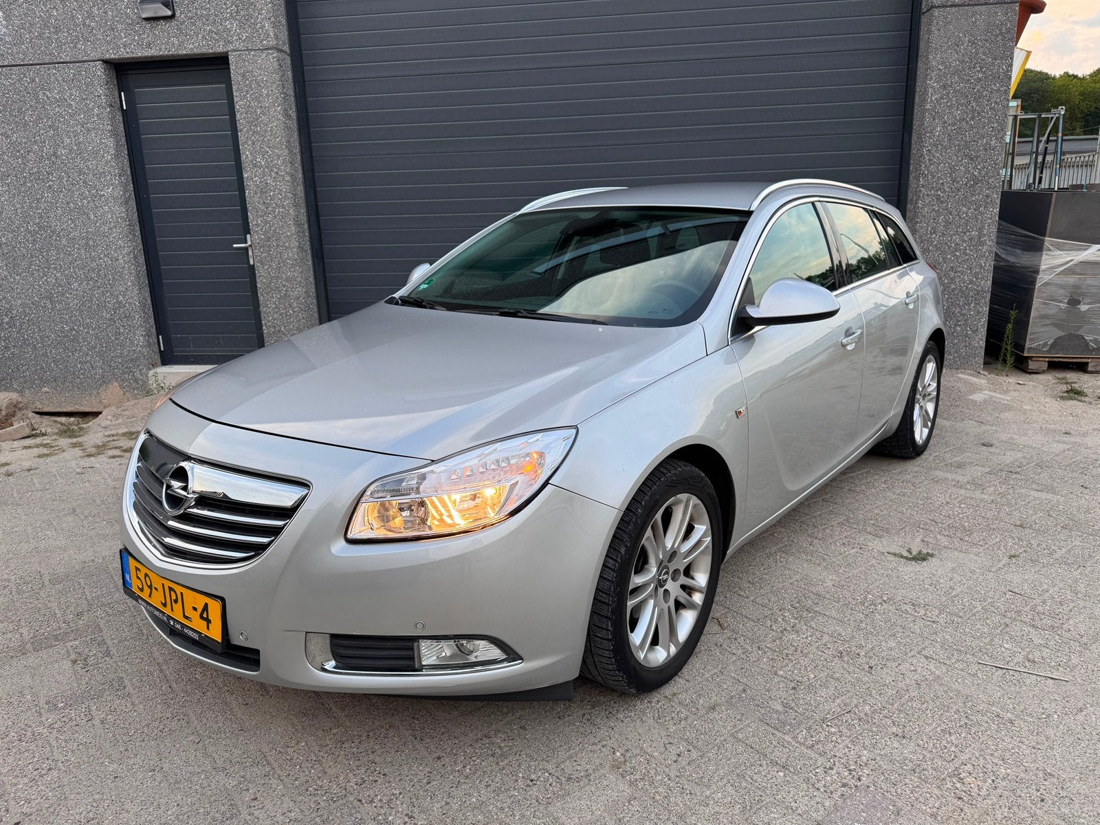 Opel Insignia 1.8 140pk Sports Tourer 2009 Grijs Airco NAP, Auto's, Opel, Stof, Zwart, 4 cilinders, 1796 cc