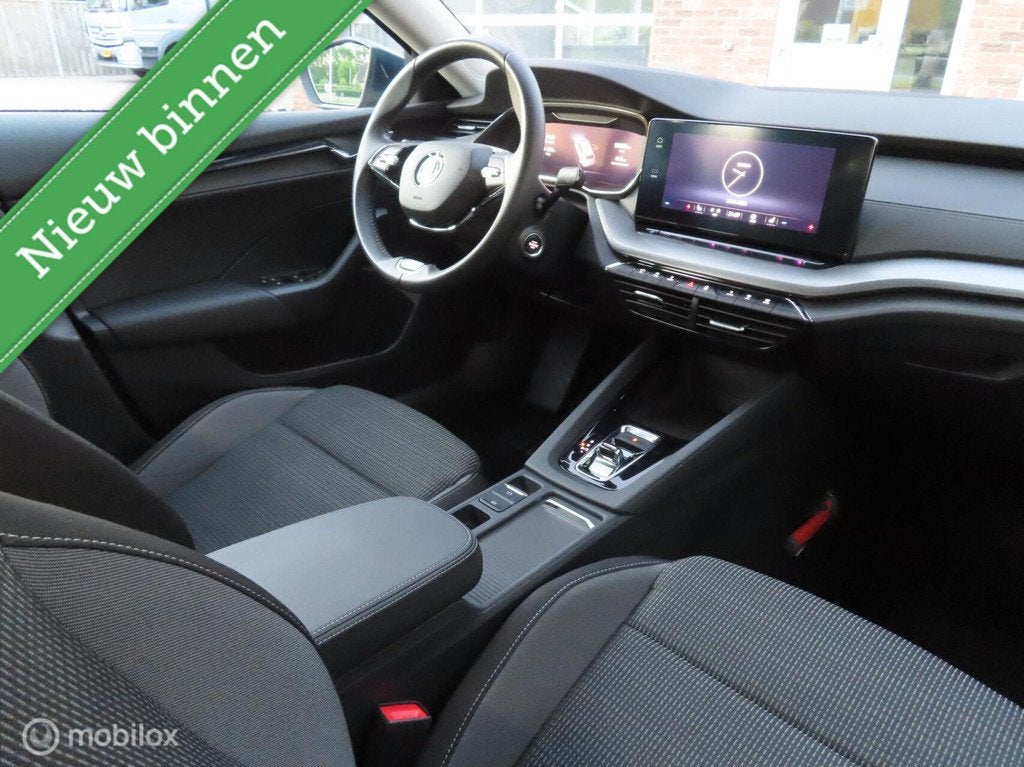 Skoda Octavia Combi 1.5 e-TSI Business Edition Plus|Electr A, Auto's, Skoda, Euro 6, 4 cilinders, 150 pk, Blauw